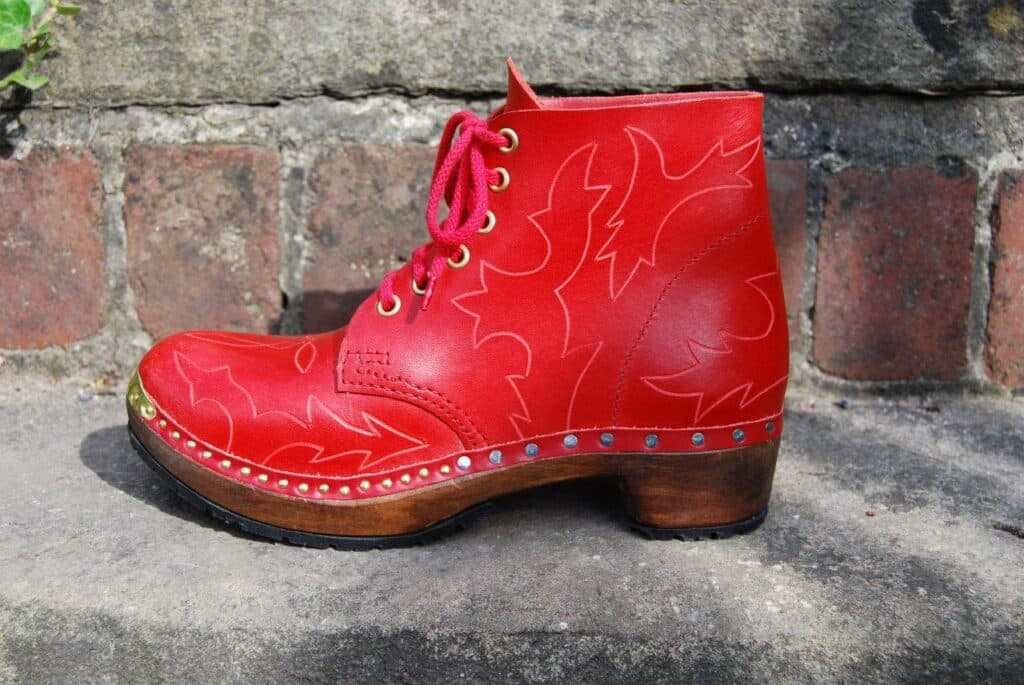 Red Derby boots with Western-style crimp